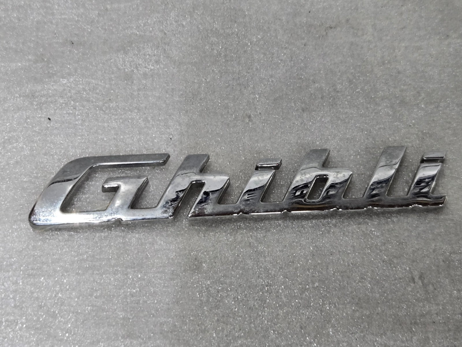 2014-2017 Maserati Ghibli Q4 Rear Lid Badge Emblem Chrome OEM 6700083150 GENUINE
