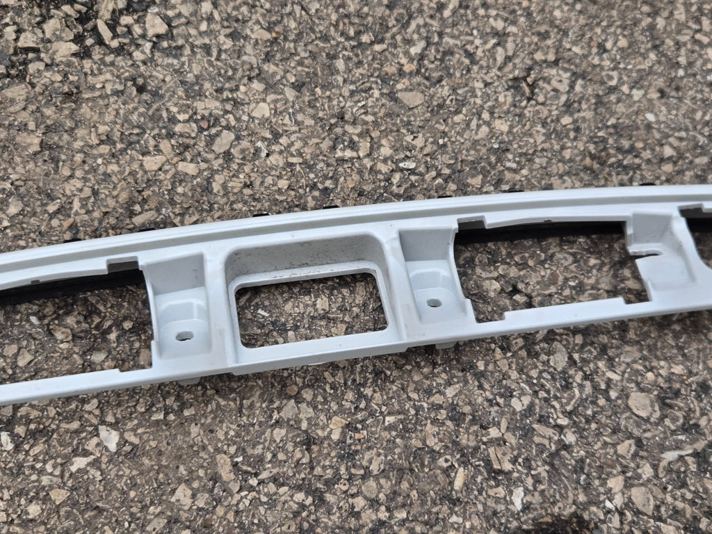 2021-24 TOYOTA CAMRY REAR TRUNK LID LICENSE PLATE MOLDING WHITE OEM 76811-06B70