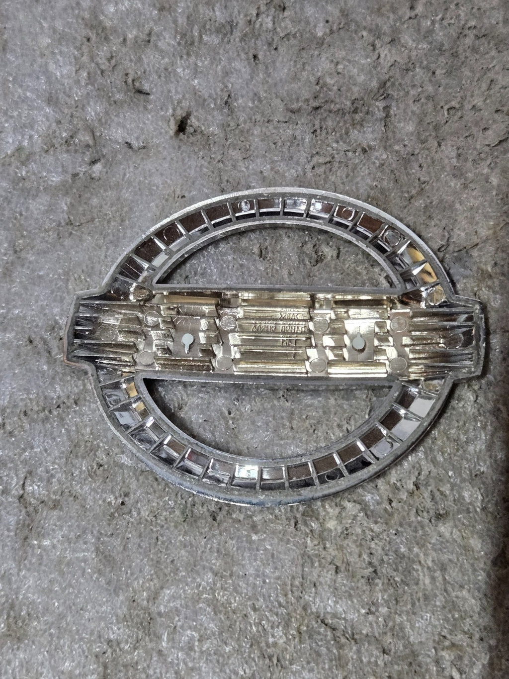 Genuine Nissan Emblem 84890-9HS0A USED OEM