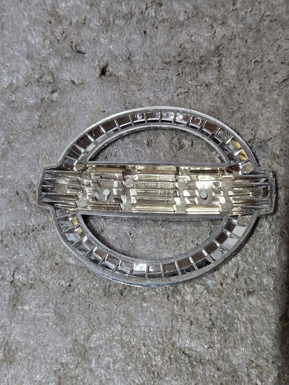 Genuine Nissan Emblem 84890-9HS0A USED OEM