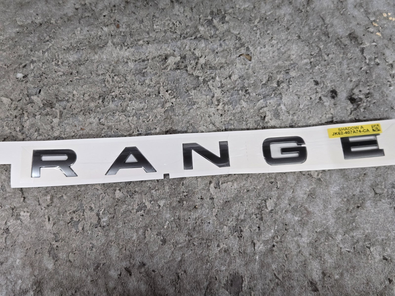 RANGE ROVER TRUNK BADGE EMBLEM OEM JK62-407A74-CA "RANGE" ONLY NEW