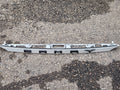 2021-24 TOYOTA CAMRY REAR TRUNK LID LICENSE PLATE MOLDING WHITE OEM 76811-06B70
