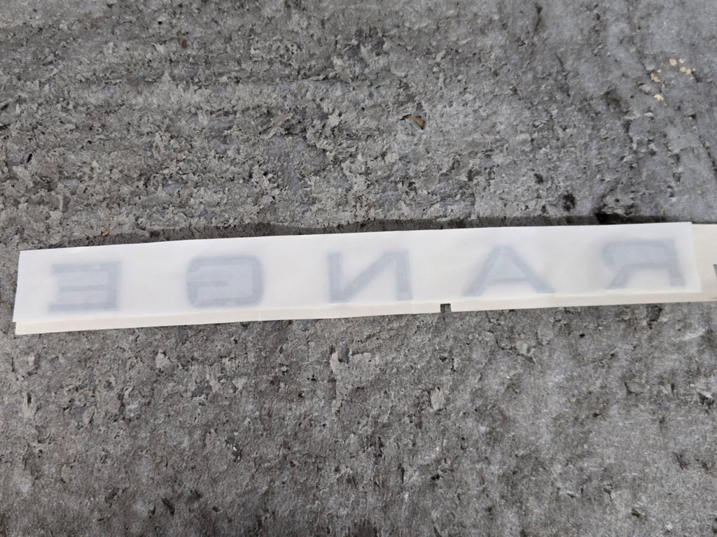 RANGE ROVER TRUNK BADGE EMBLEM OEM JK62-407A74-CA "RANGE" ONLY NEW