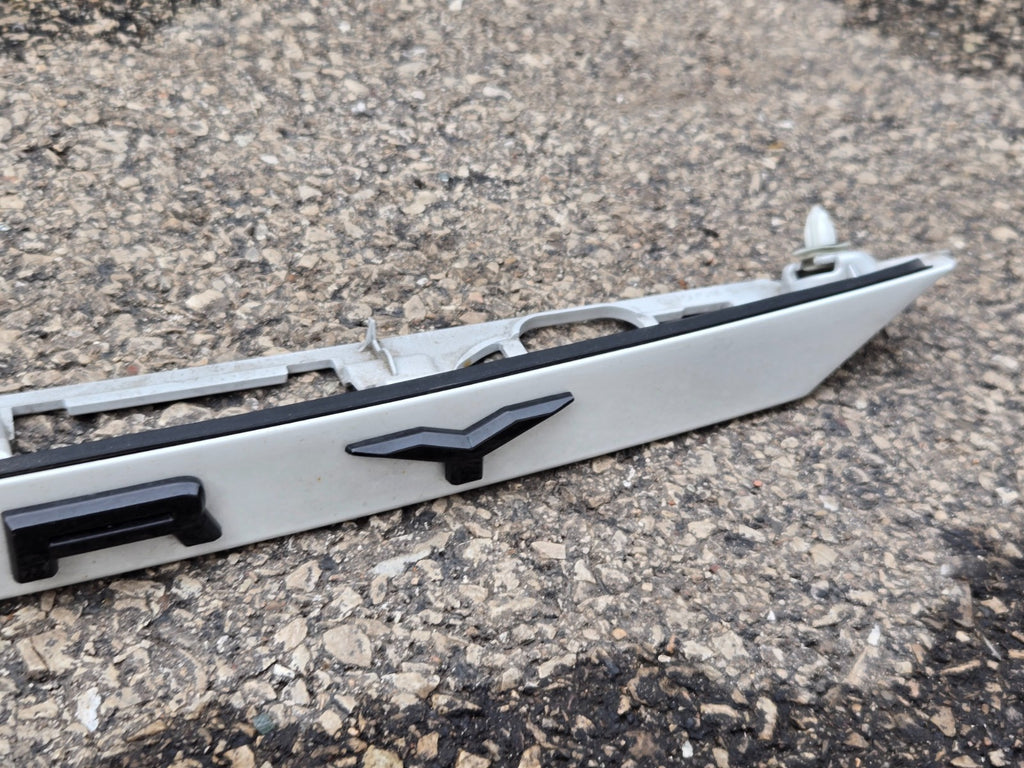 2021-24 TOYOTA CAMRY REAR TRUNK LID LICENSE PLATE MOLDING WHITE OEM 76811-06B70